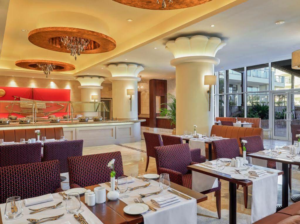 Steigenberger Pyramids Cairo Hotel Al Kawm al Akhdar Kültér fotó The restaurant